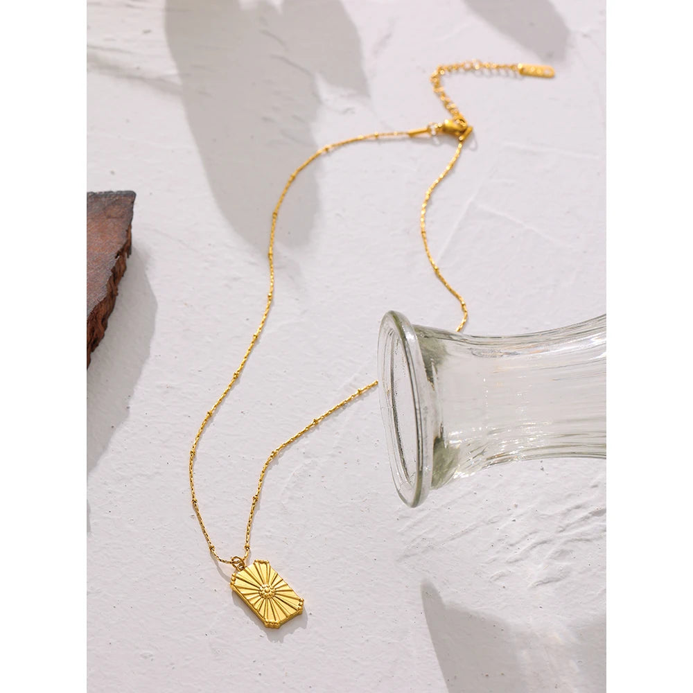 Golden Radiance Pendant - Cardi Bella