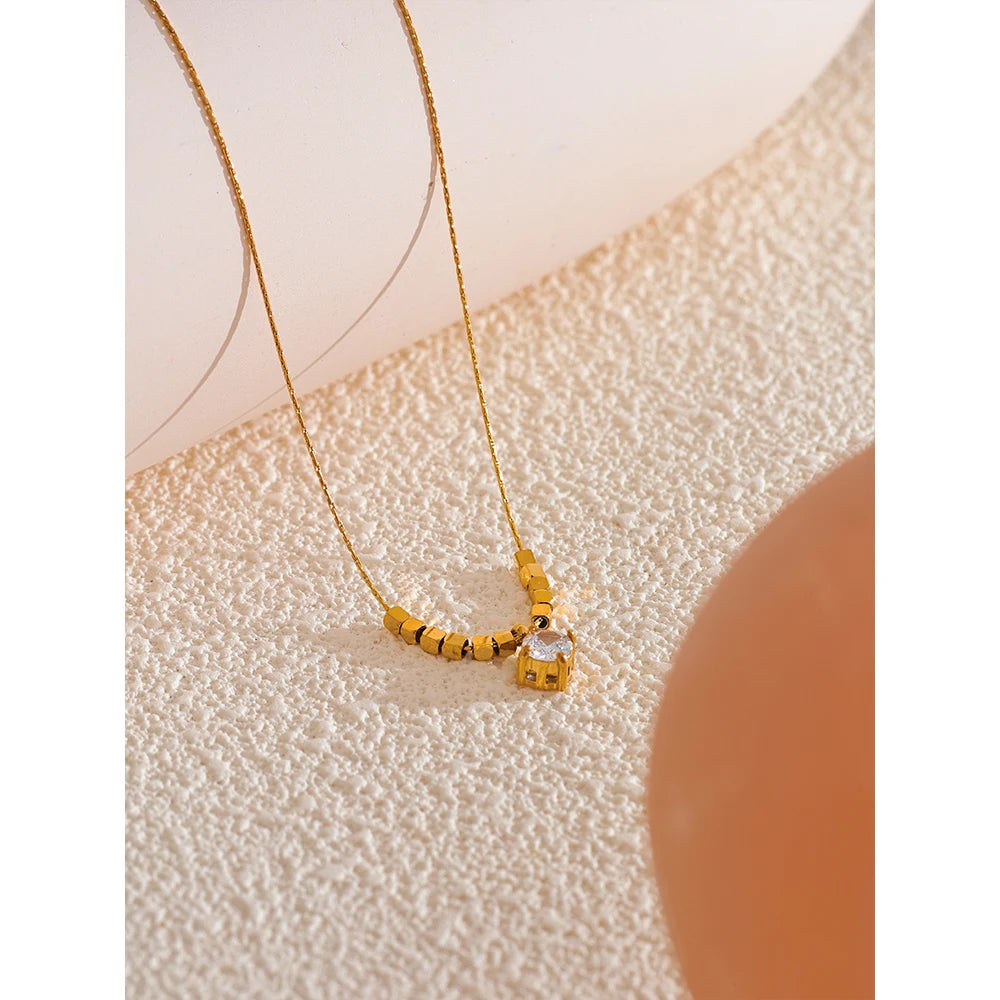 Golden Glimmer Bead Necklace - Cardi Bella