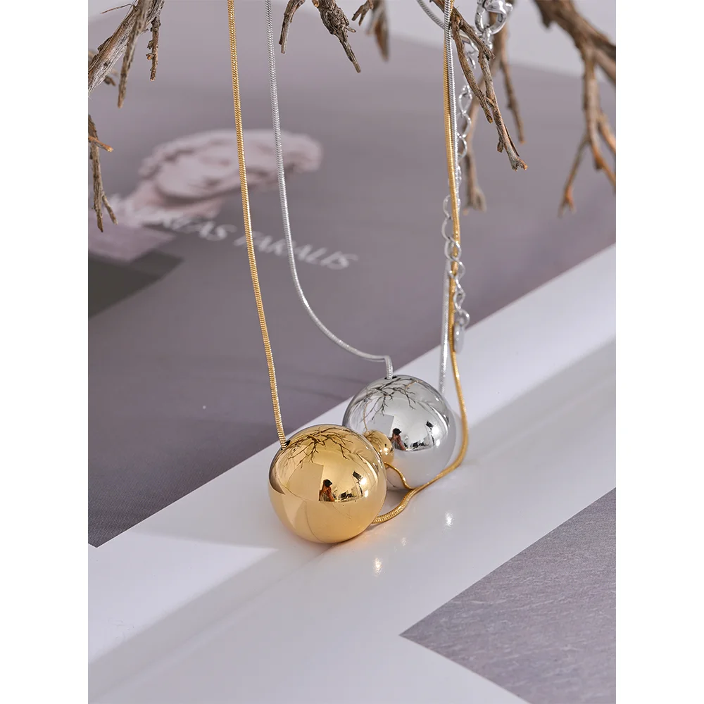 Golden Orb Necklace - Cardi Bella