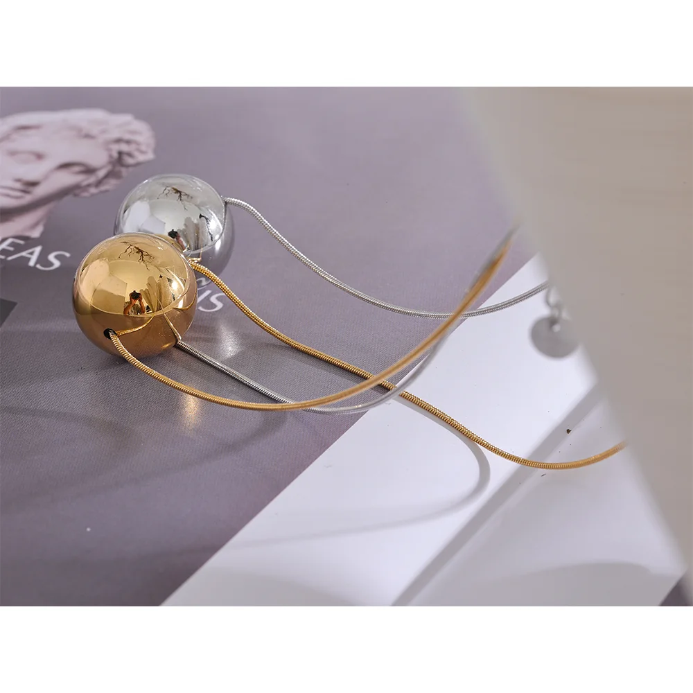 Golden Orb Necklace - Cardi Bella