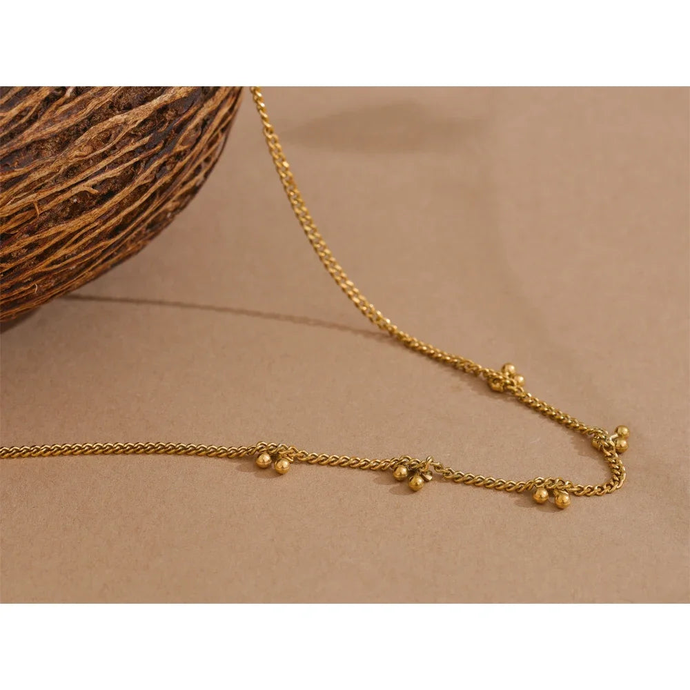 Golden Droplets Necklace - Cardi Bella