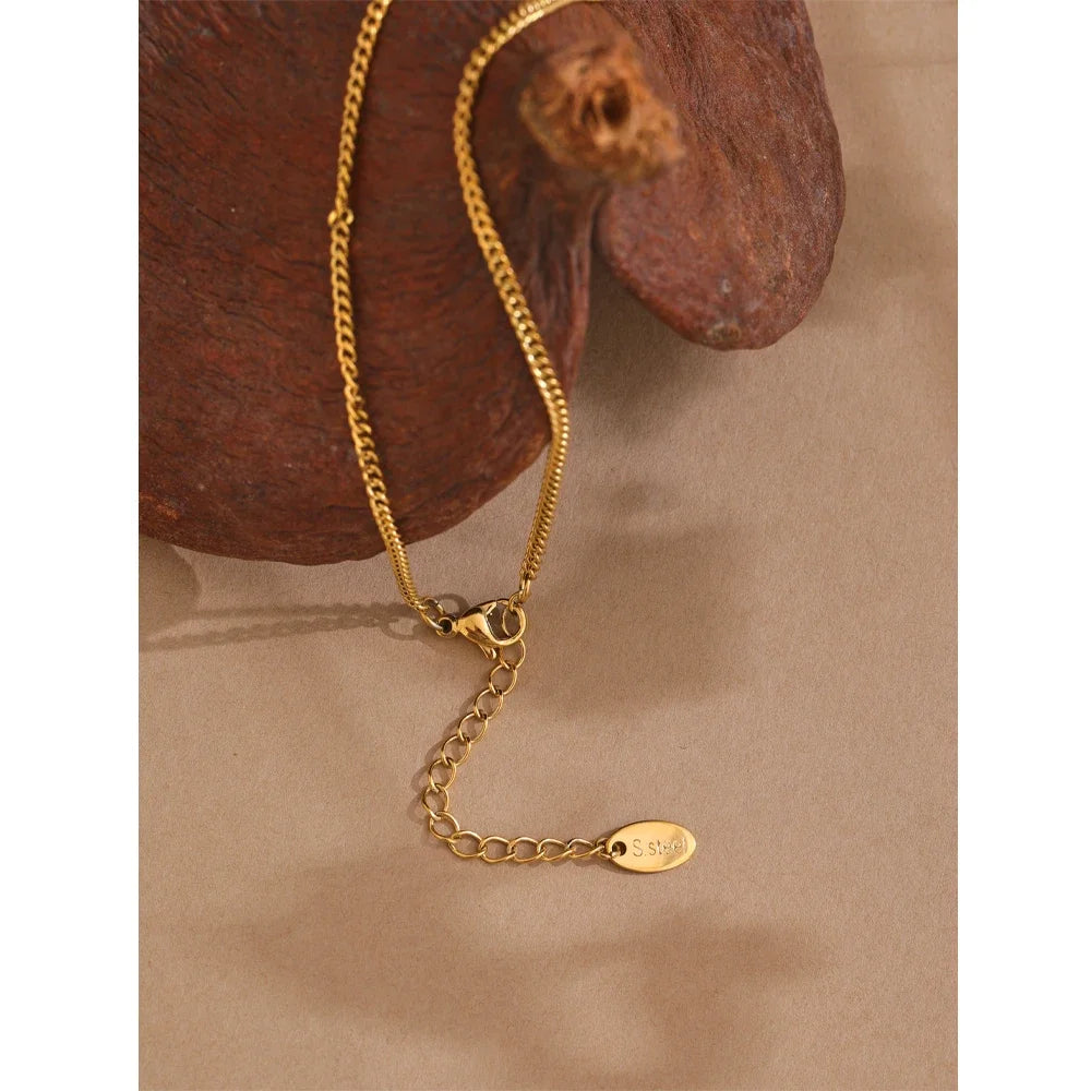 Golden Droplets Necklace - Cardi Bella