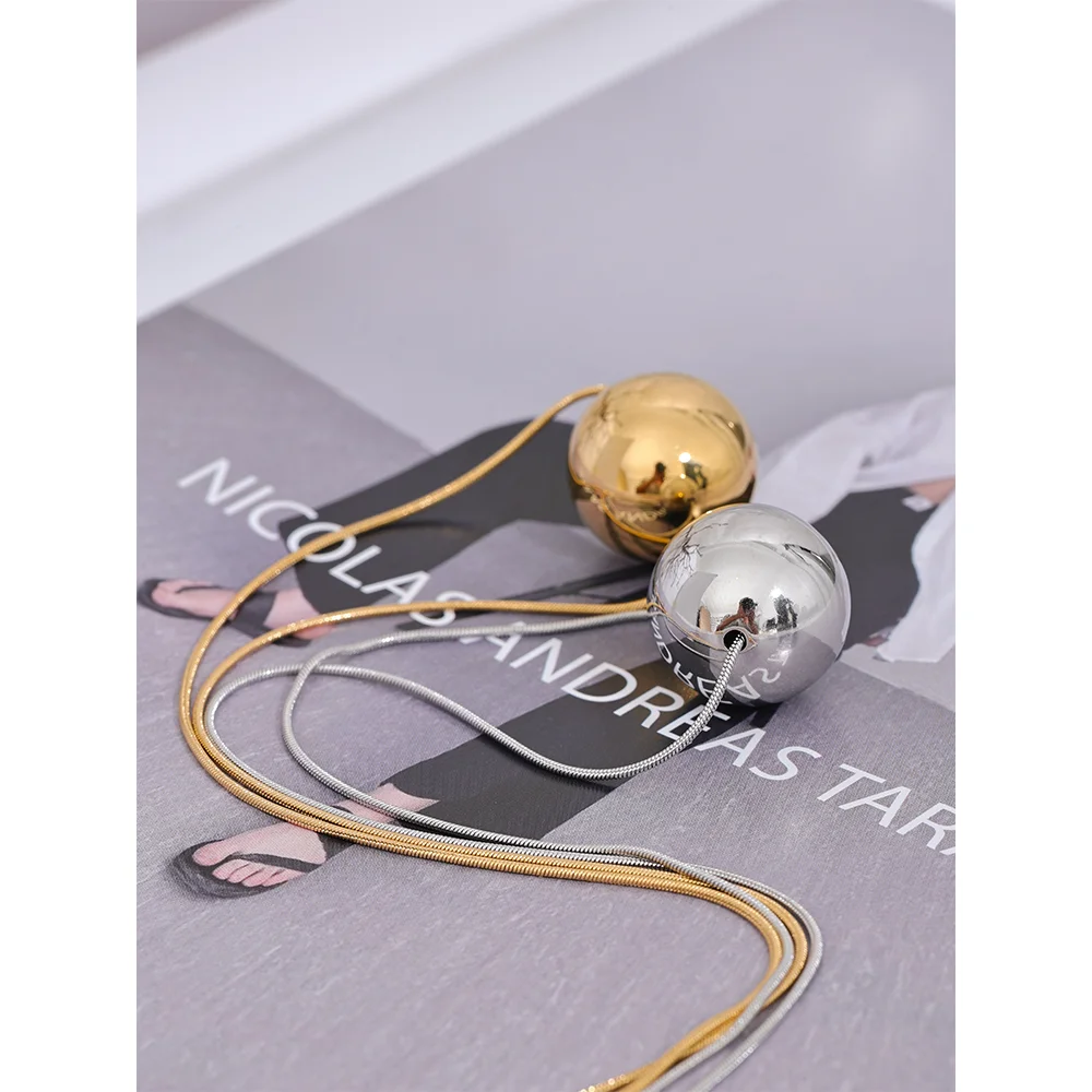 Golden Orb Necklace - Cardi Bella
