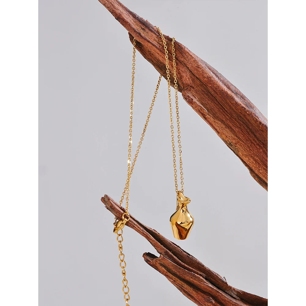 The Gilded Pour Pendant - Cardi Bella