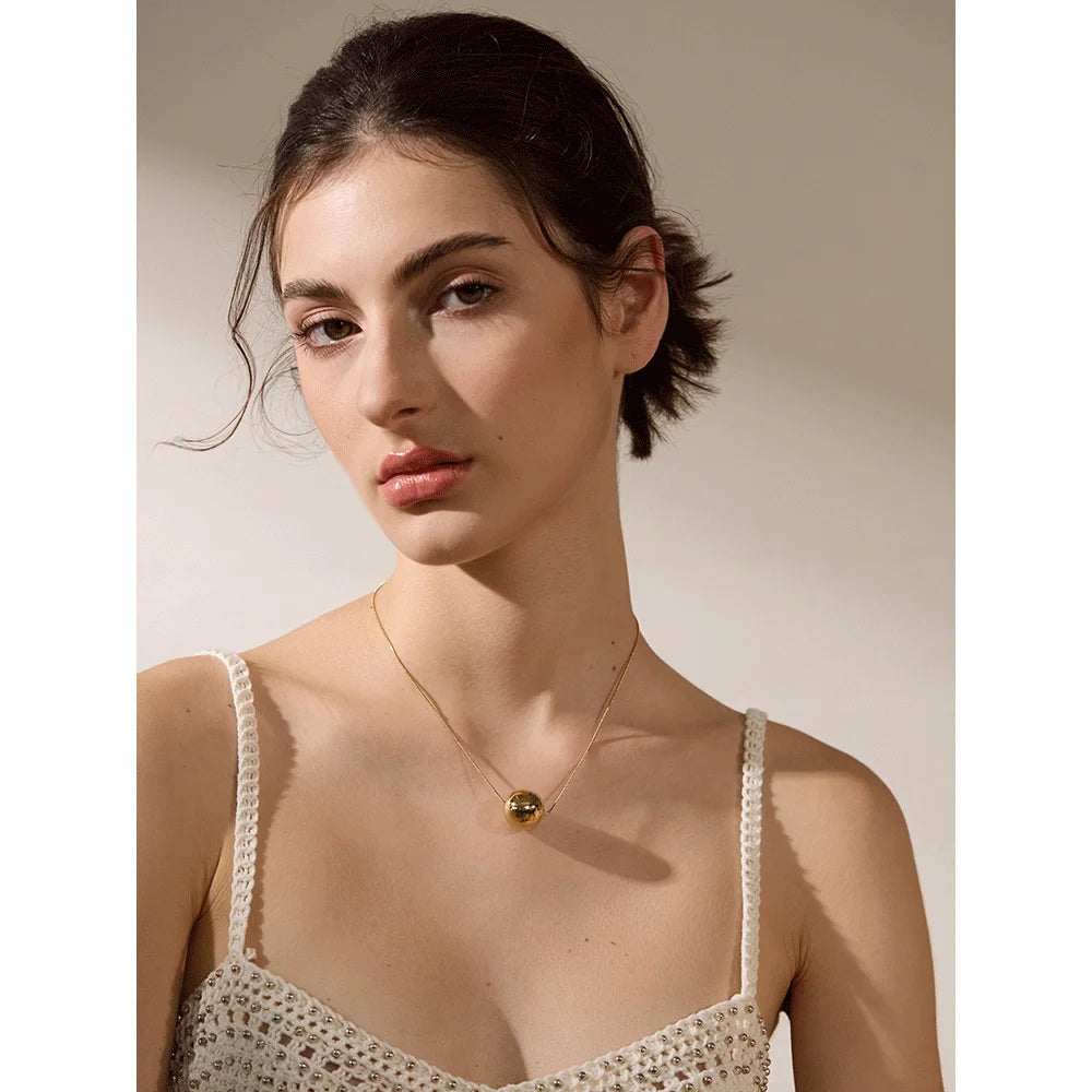 Golden Orb Necklace - Cardi Bella