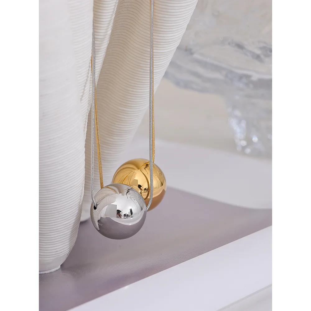 Golden Orb Necklace - Cardi Bella