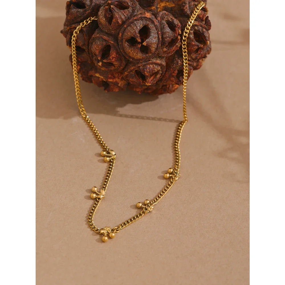 Golden Droplets Necklace - Cardi Bella
